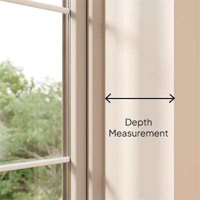 A photo showing where to get the depth measurement on the recess of a window.